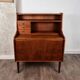 Teak secretary with drawers and sliding top, Denmark, 1960.