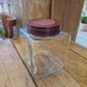 Ancient moulded glass jar with bakelite lid 20th century