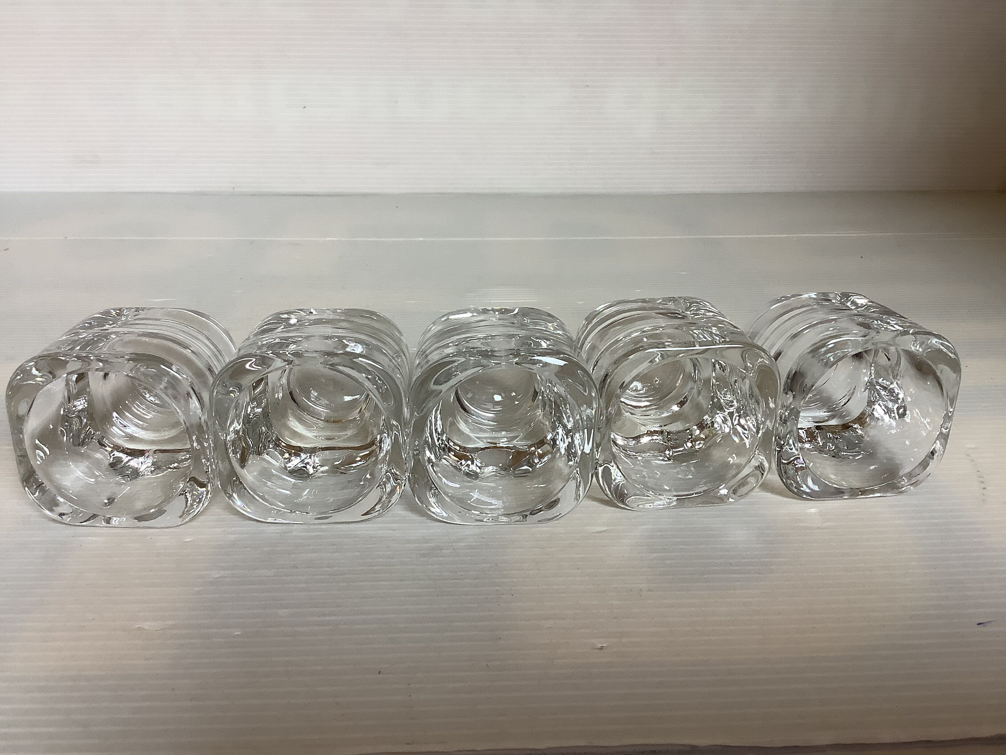 Five candle holders or egg cups designed by Joe Colombo.