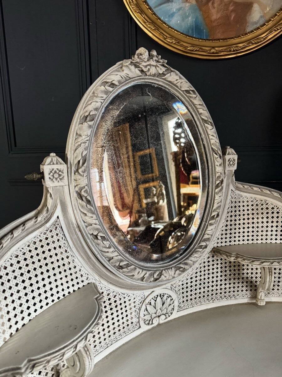 Coiffeuse du XIXe en bois peint et cannage de style Louis XVI