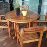 Table en bois d'iroko et ses 4 fauteuils