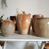 Ancient jar in varnished sandstone