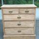 English stripped commode made of solid raw wood from the 19th century.