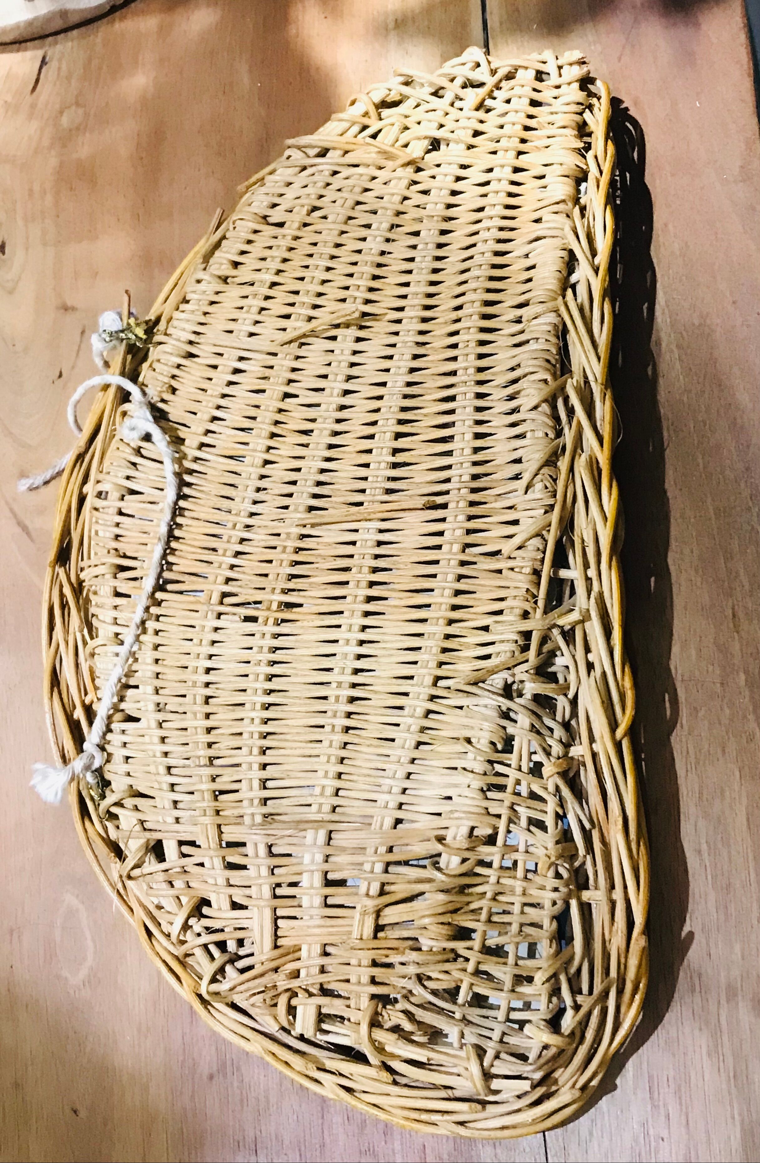 Vintage half moon rattan mirror