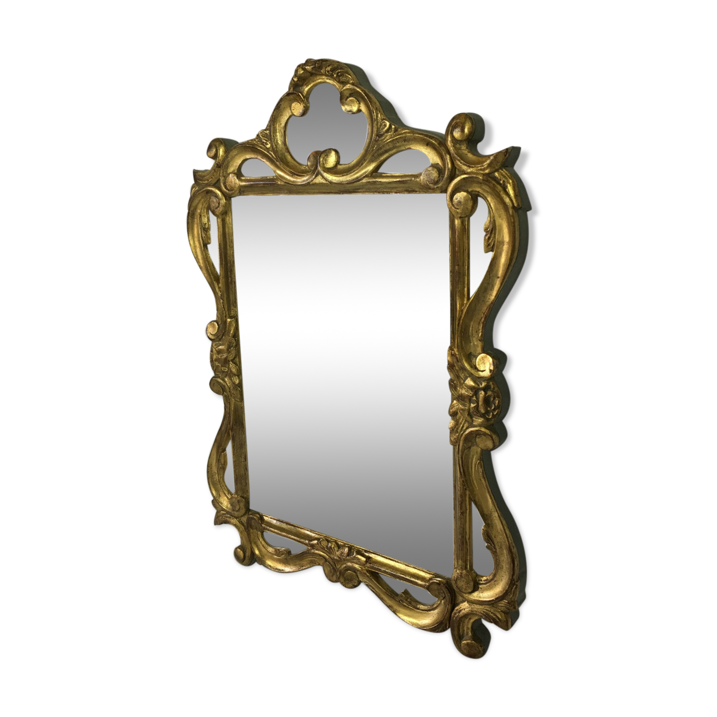 Gilded and patinated mirror sculpted 55 x 37cm