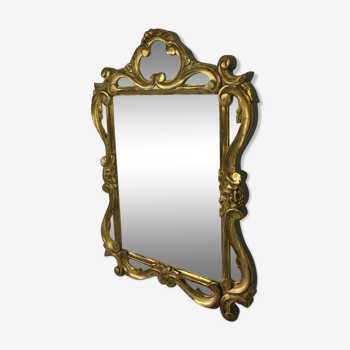 Gilded and patinated mirror sculpted 55 x 37cm