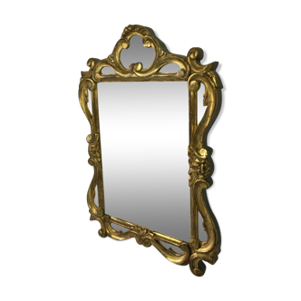 Gilded and patinated mirror sculpted 55 x 37cm