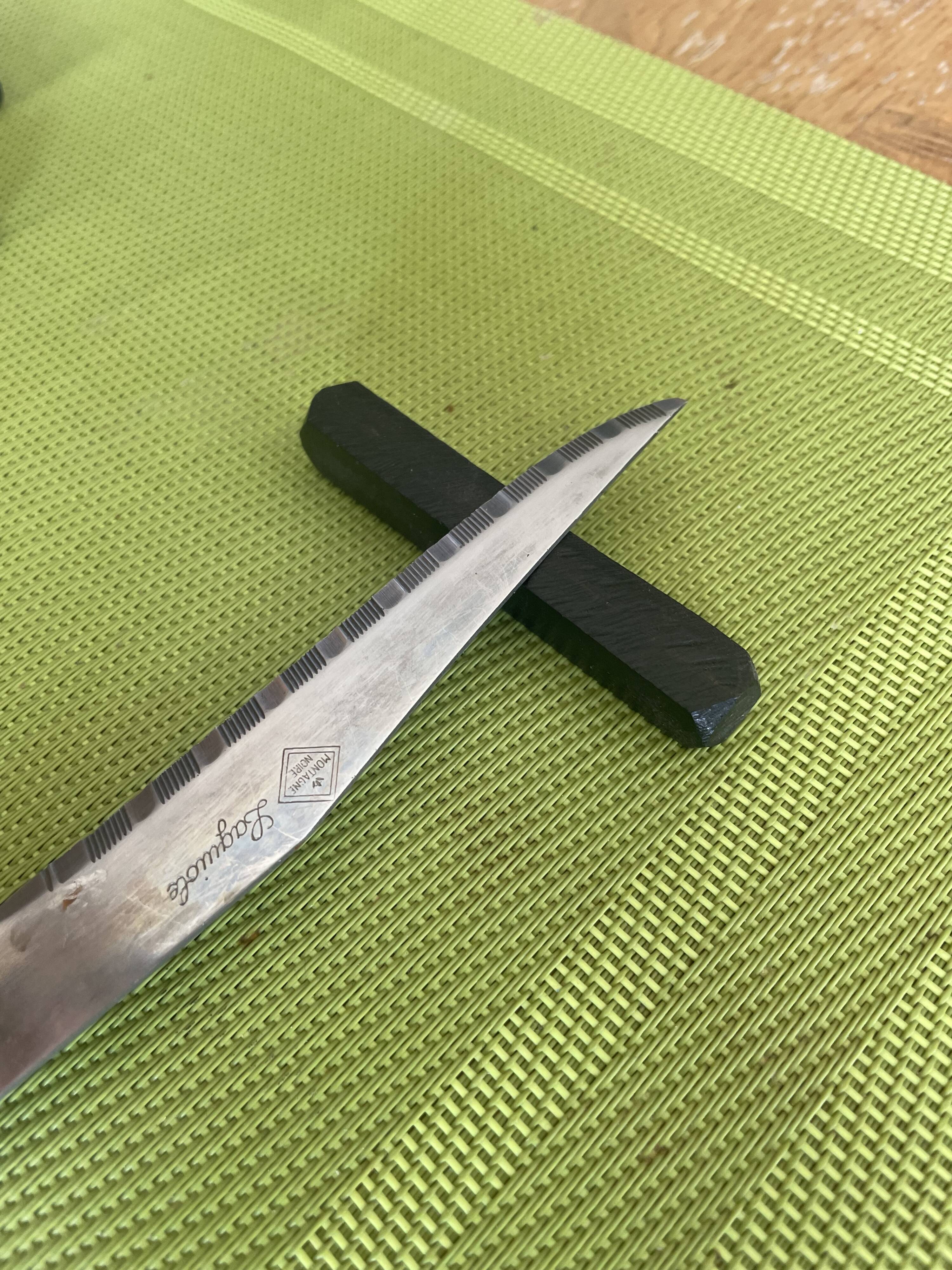 Set of 12 vintage ebony knife rests