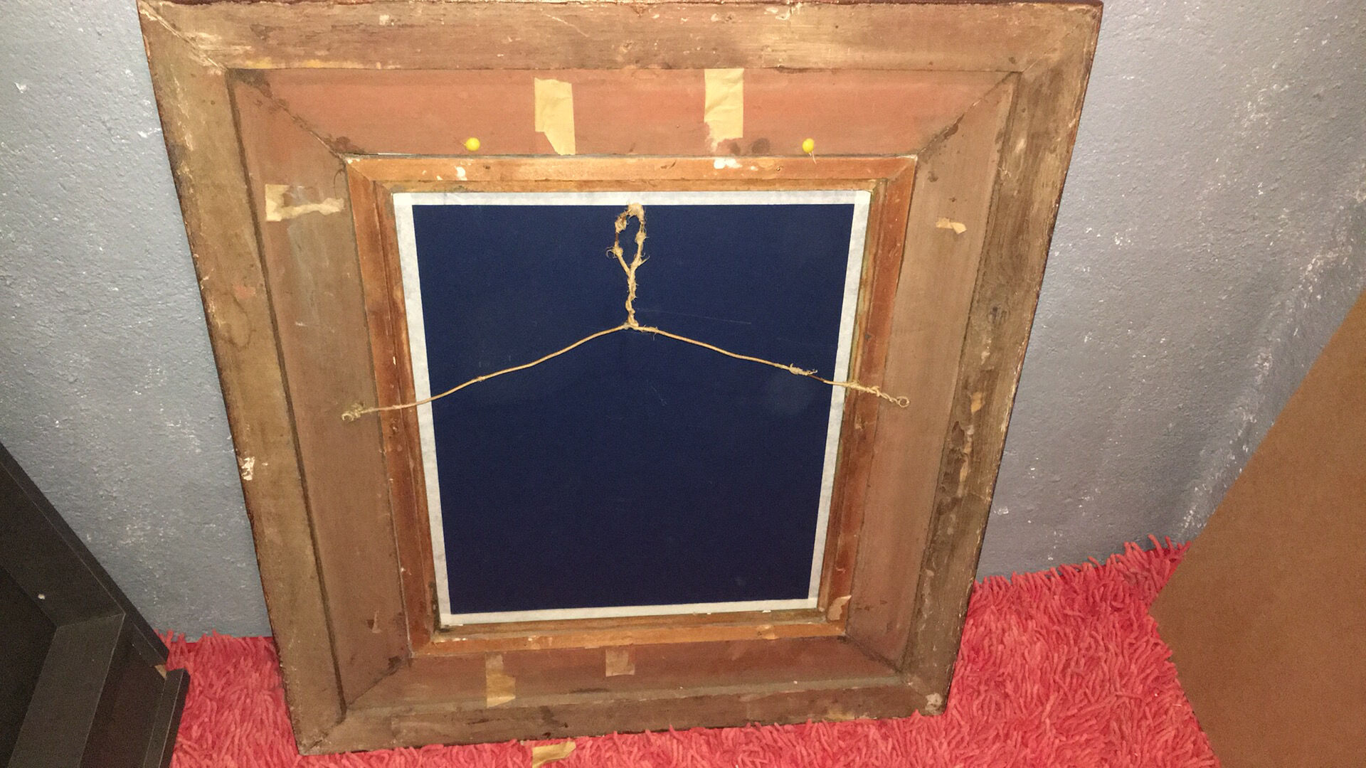 Mirror in gold frame