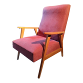 Vintage red armchair with compass feet in Scandinavian design