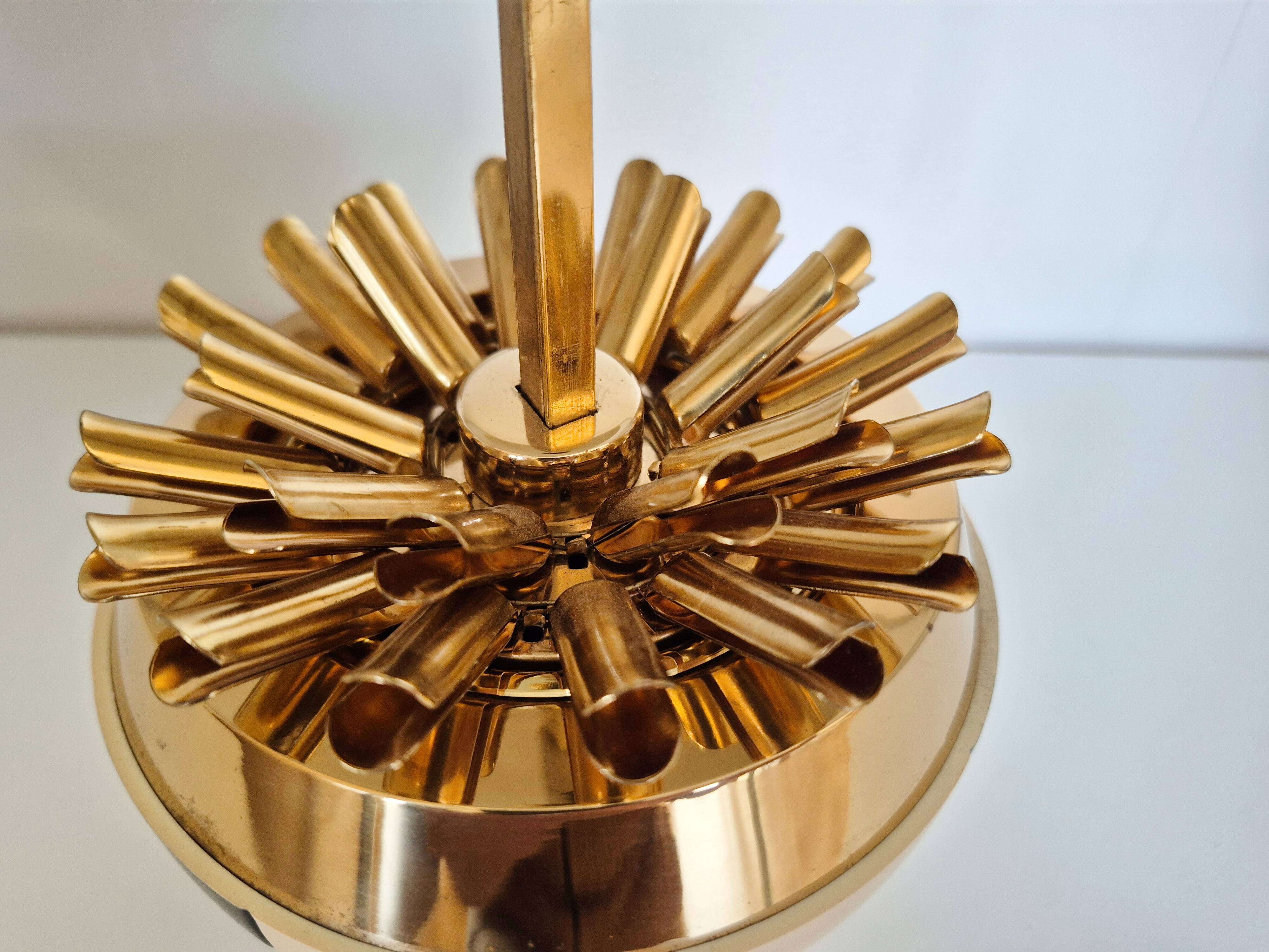 Vintage cigarette dispenser in the shape of a football.