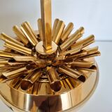 Vintage cigarette dispenser in the shape of a football.