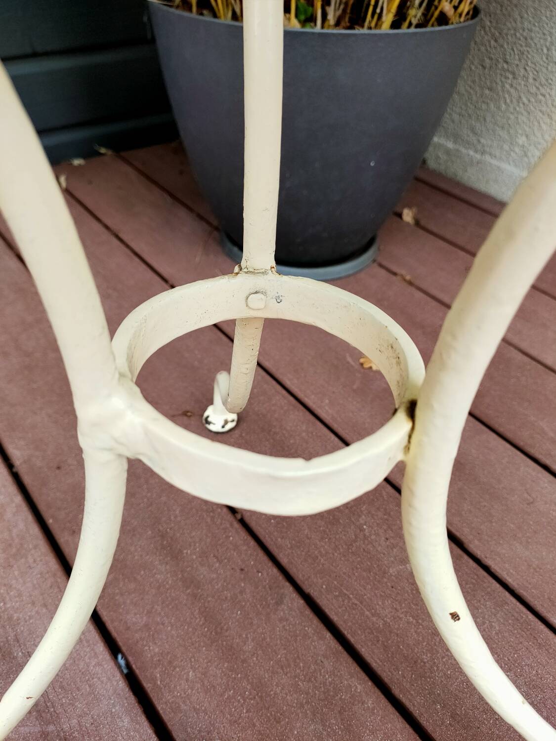 Old white iron garden table