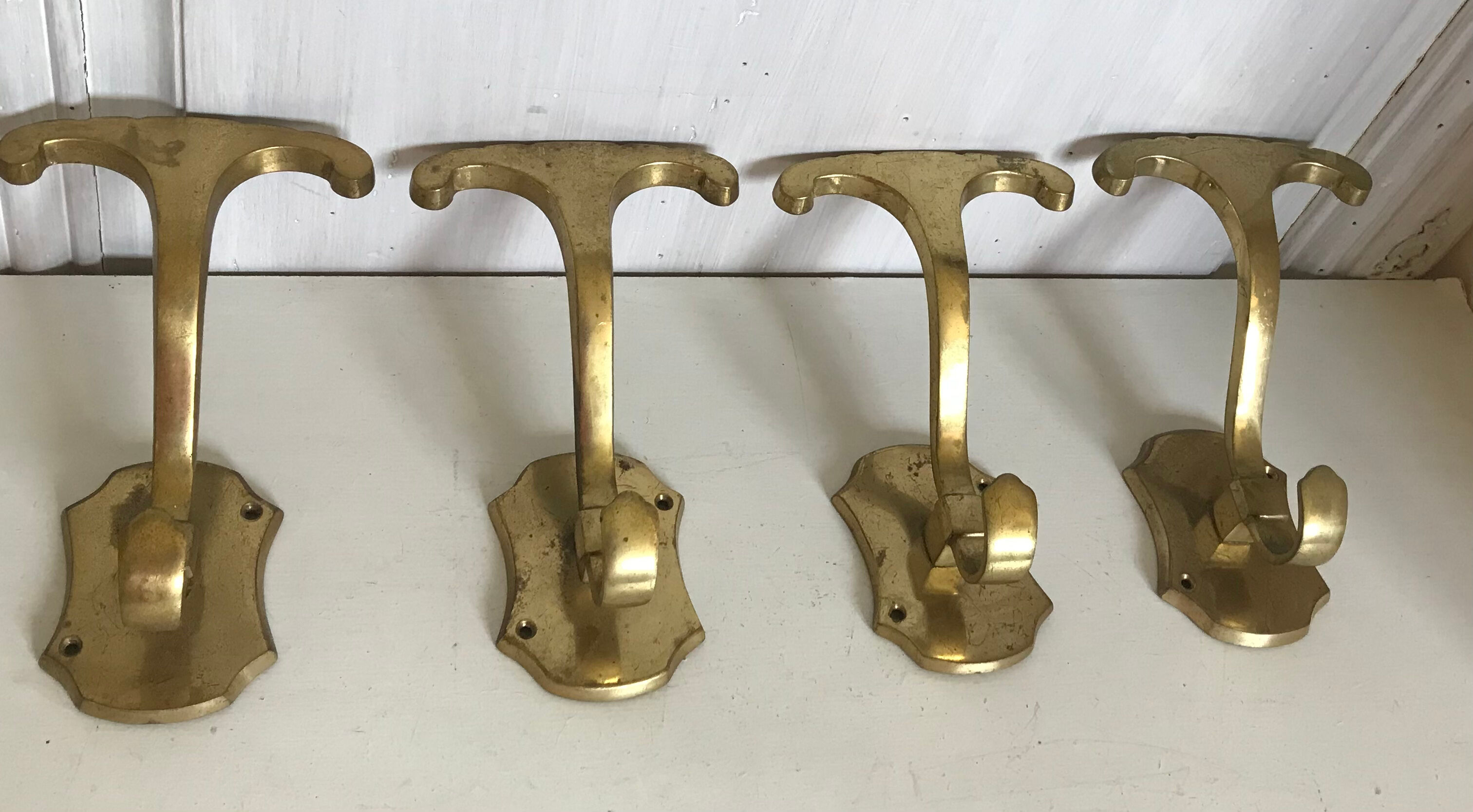 Pair of brass patères