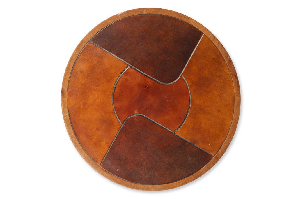 Stools and wall lights in cherry wood and leather. 1970s.