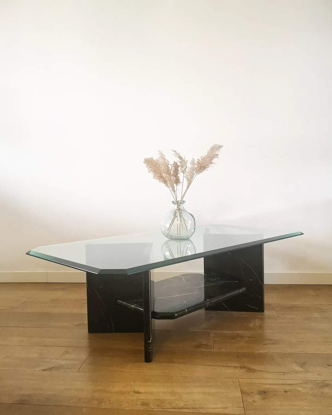 Glass coffee table and black marble base