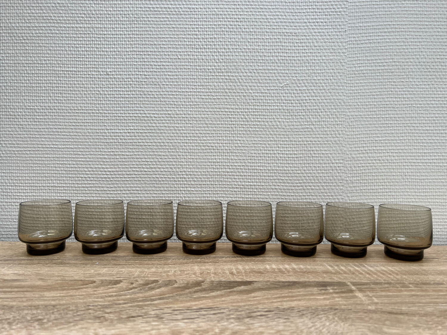Eight smoked glass water glasses