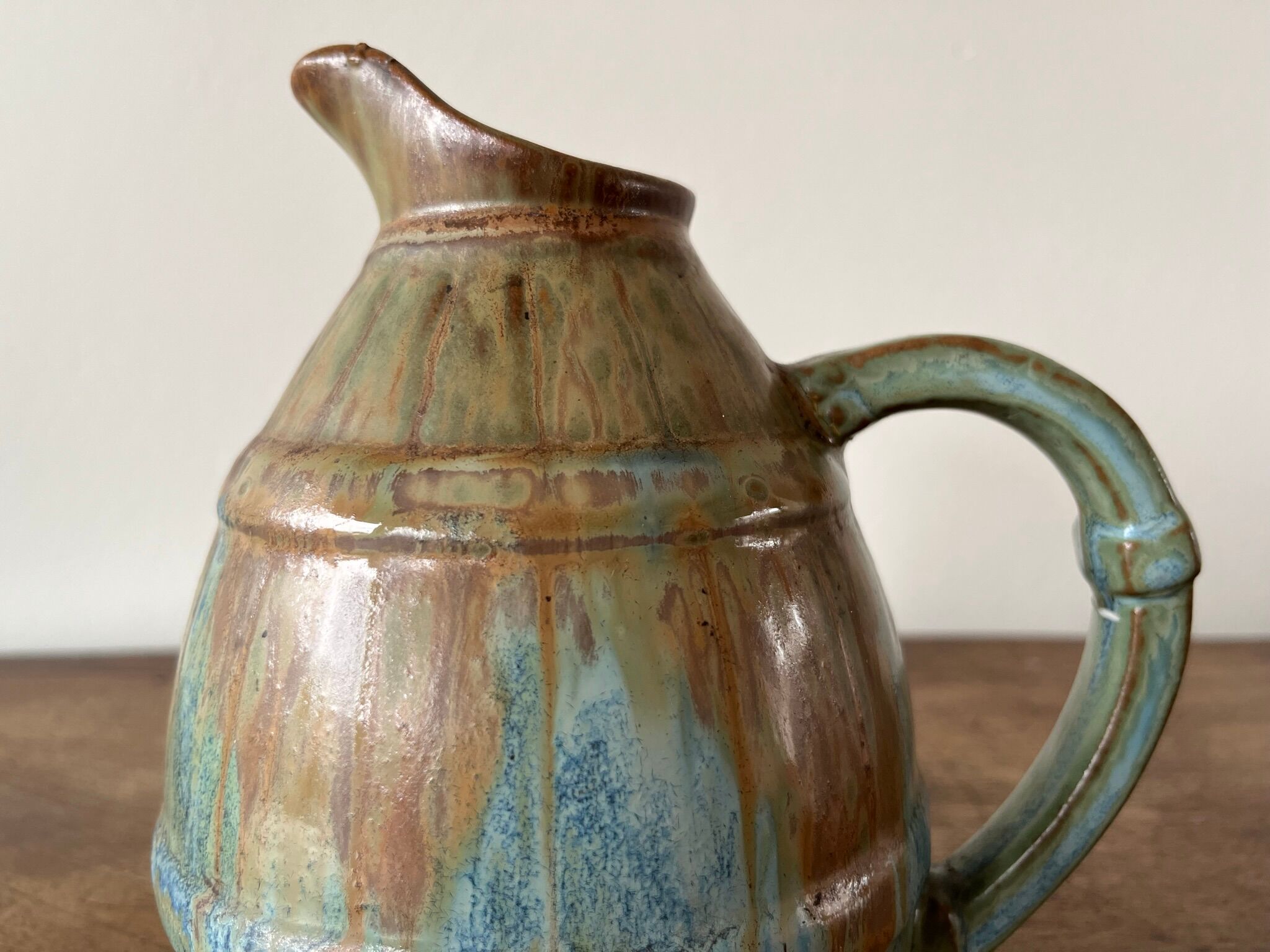 Pitcher in flamed sandstone
