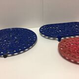 Set of four enameled cast iron trivets retro design vintage art