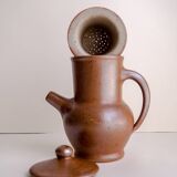 Handcrafted stoneware teapot with strainer