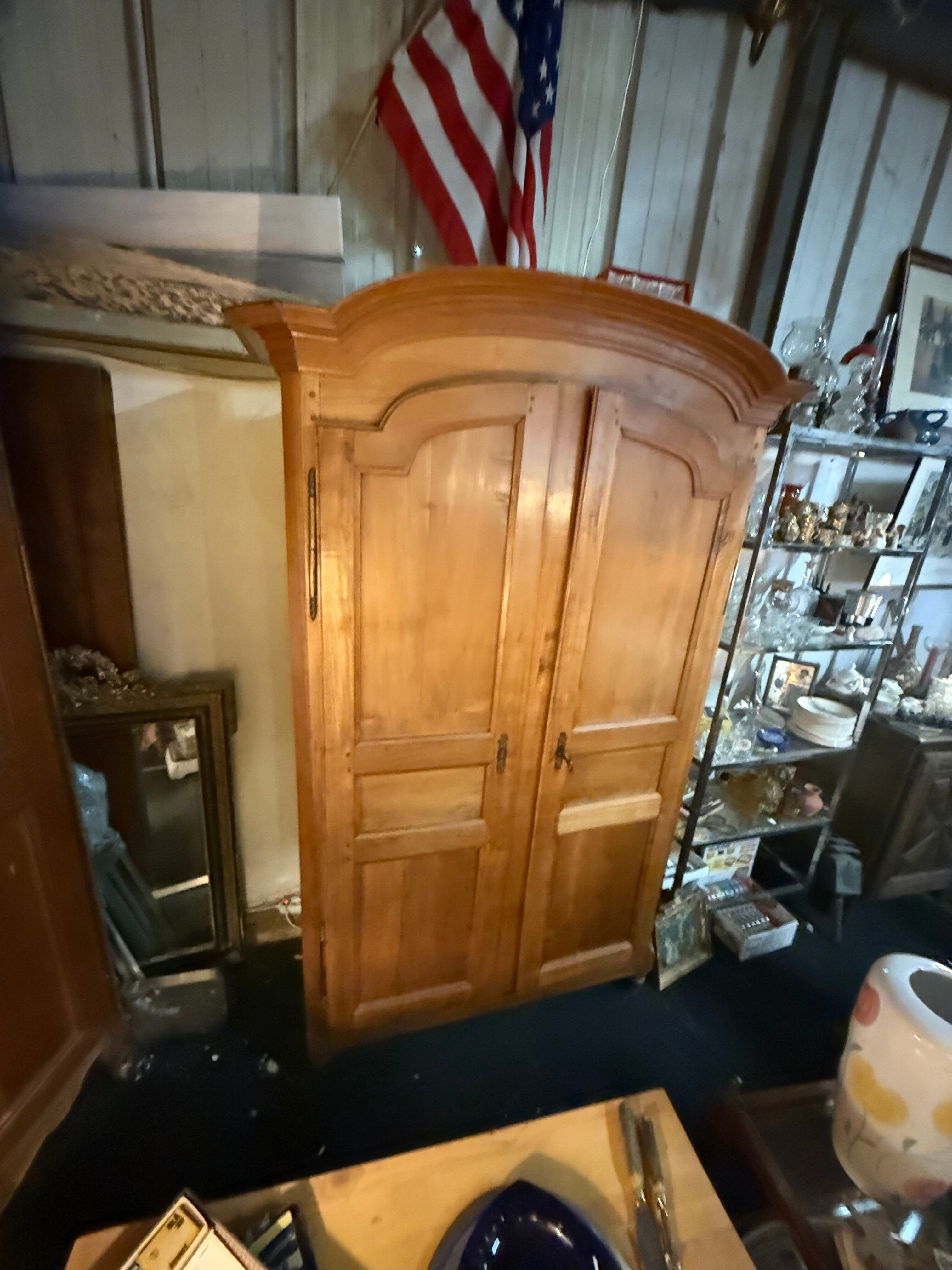 Louis XV wardrobe with a gendarme hat.