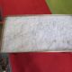 Table basse style louis XVI en acajou et laiton