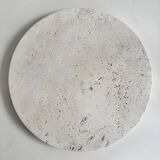 Circular flat travertine pocket emptier