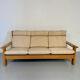 Three-seater canapé in solid oak with Scandinavian design fabric from the 1970s.