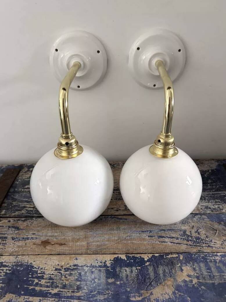 Pair of white opaline sconces