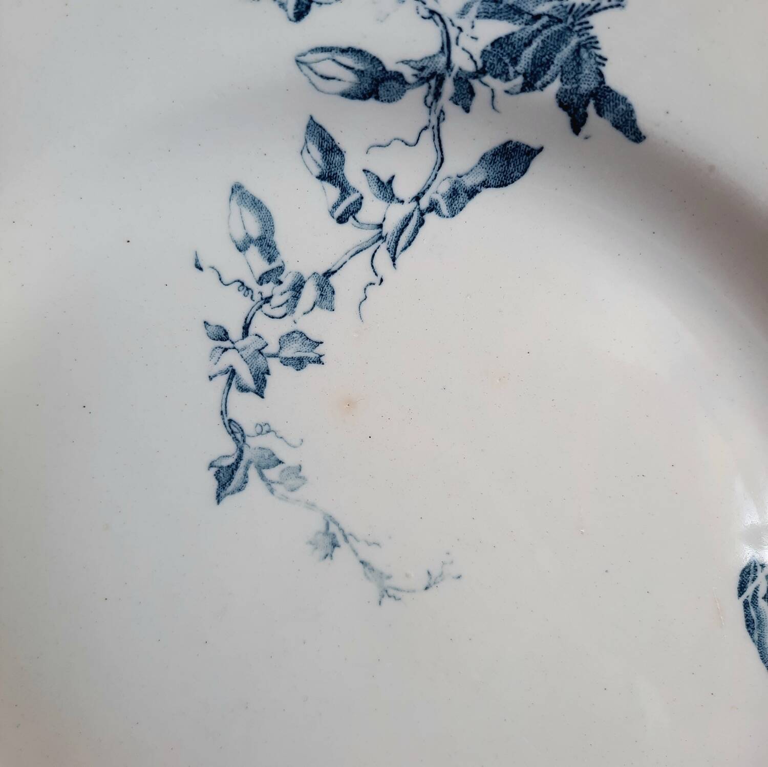 Old mismatched dinner plates accompanied by a dish