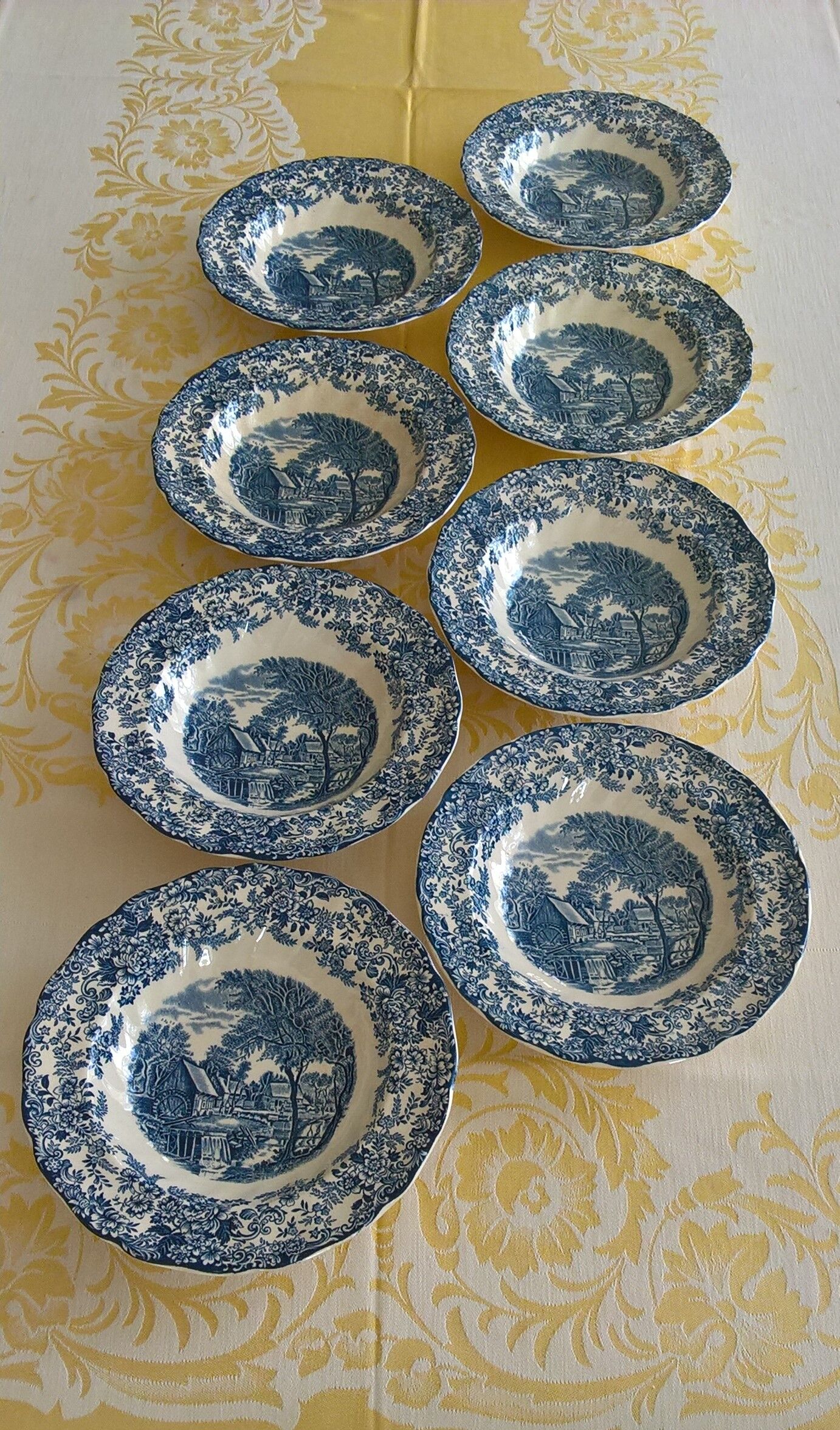 Eight English hollow plates Johnson Bros "Mill Stream"