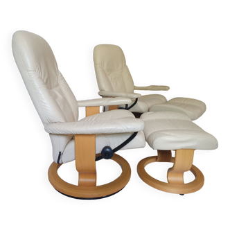 Stressless Beige leather armchairs with footrest