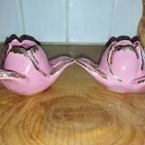 A pair of pink earthenware candlesticks (1940s–50s)