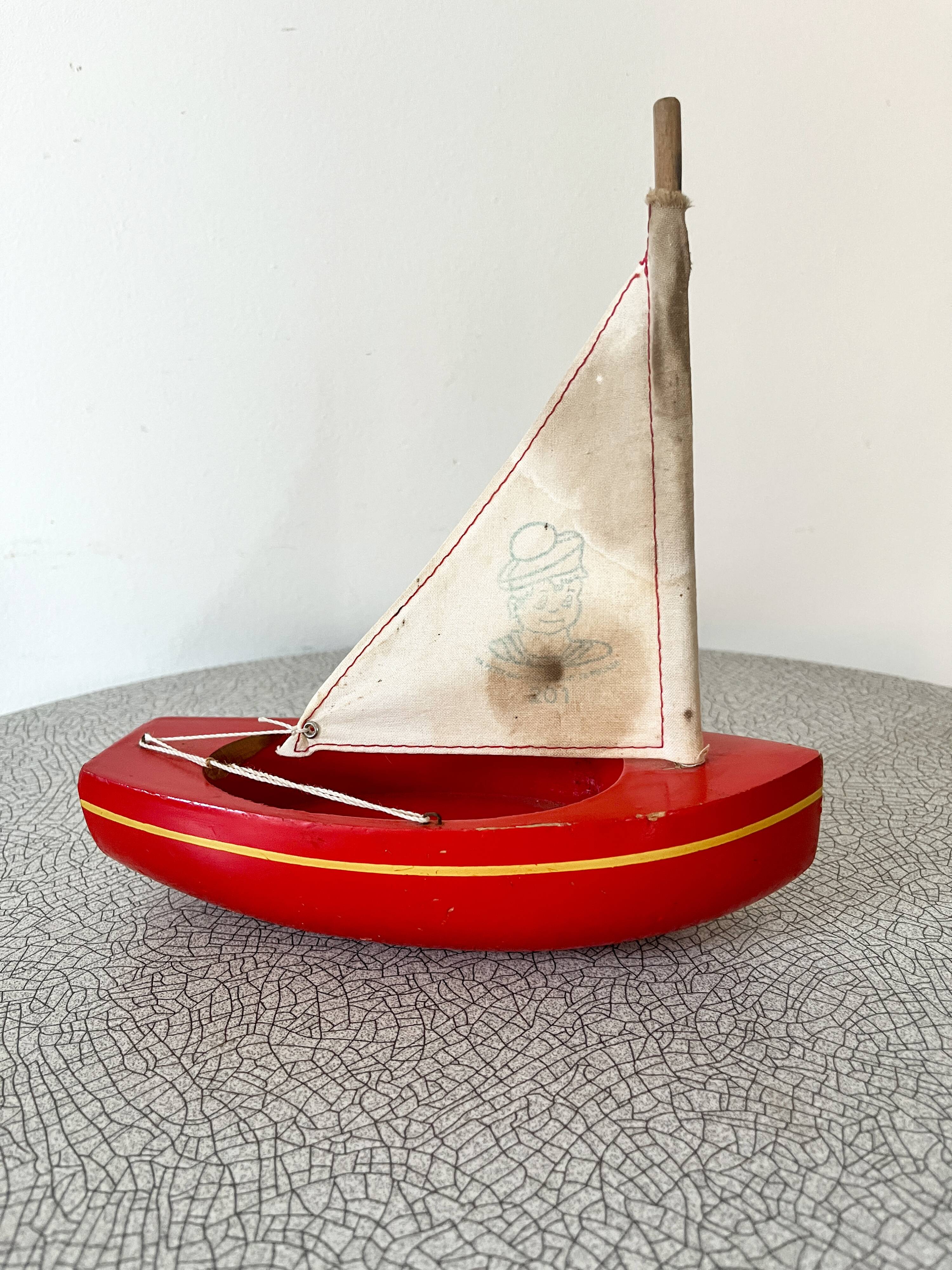 Small Tirot brand basin sailboat, model 201, vintage toy