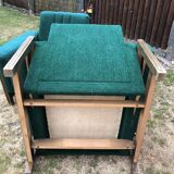 Duo of vintage armchairs with green fabrics.