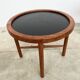 Duo of round coffee tables with a reversible top — Crossed base