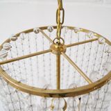 Lustre quatre flammes avec perles de verre laiton