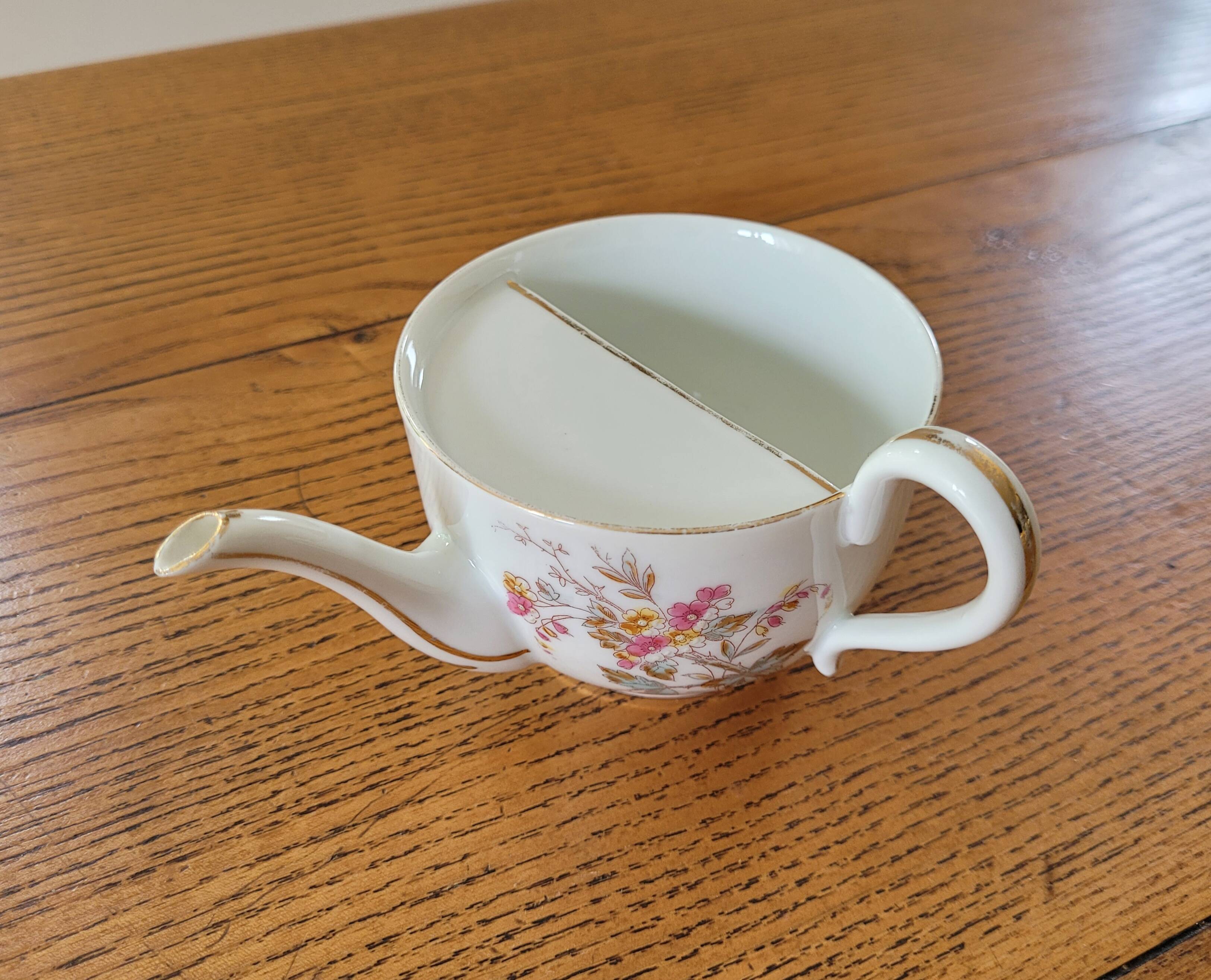 Antique porcelain duck mug for the sick