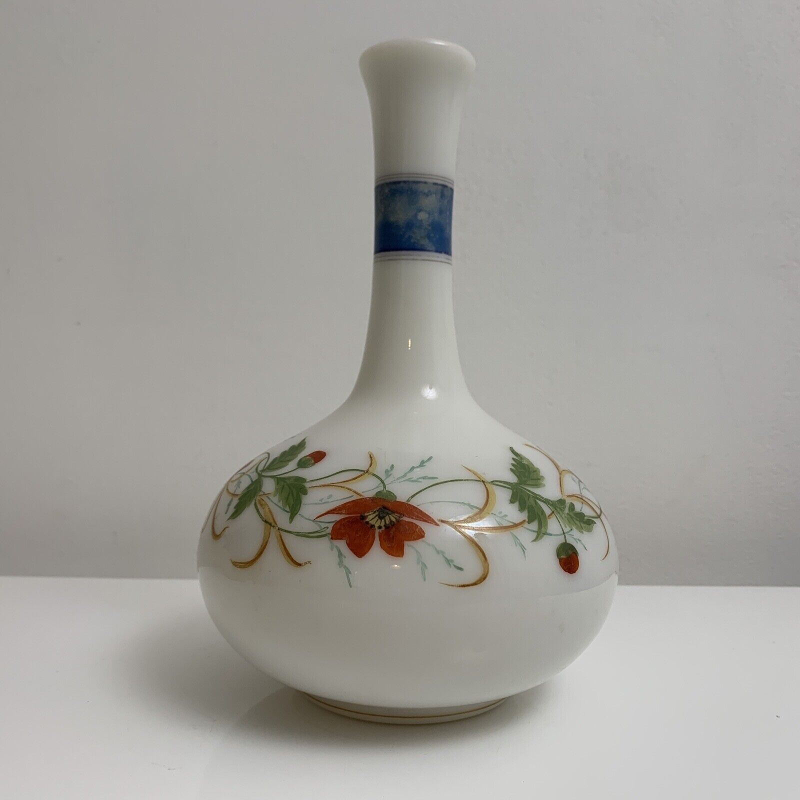 Old vase in opaline floral decoration painted