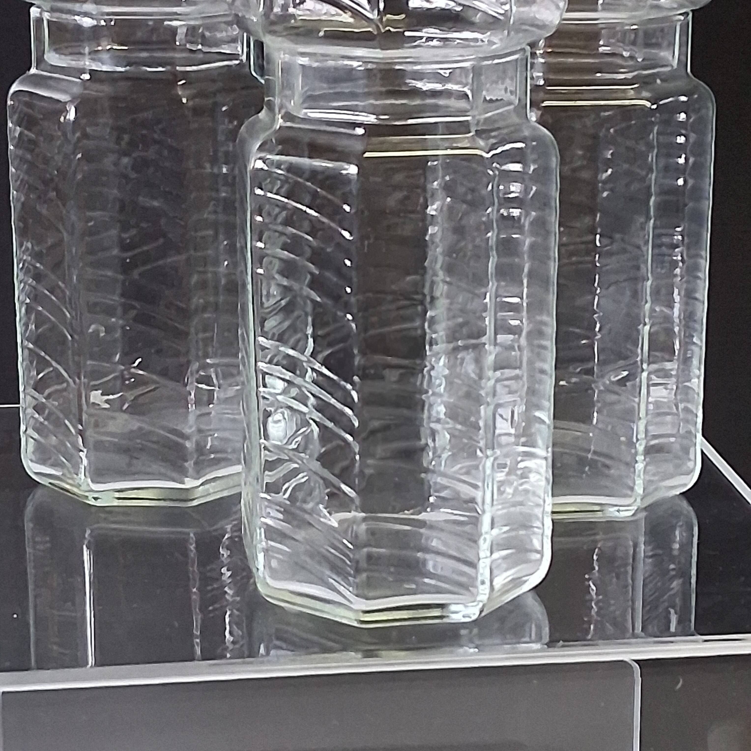 Set of 3 glass jars with old transparent lids in very good condition.