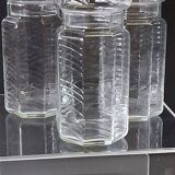 Set of 3 glass jars with old transparent lids in very good condition.