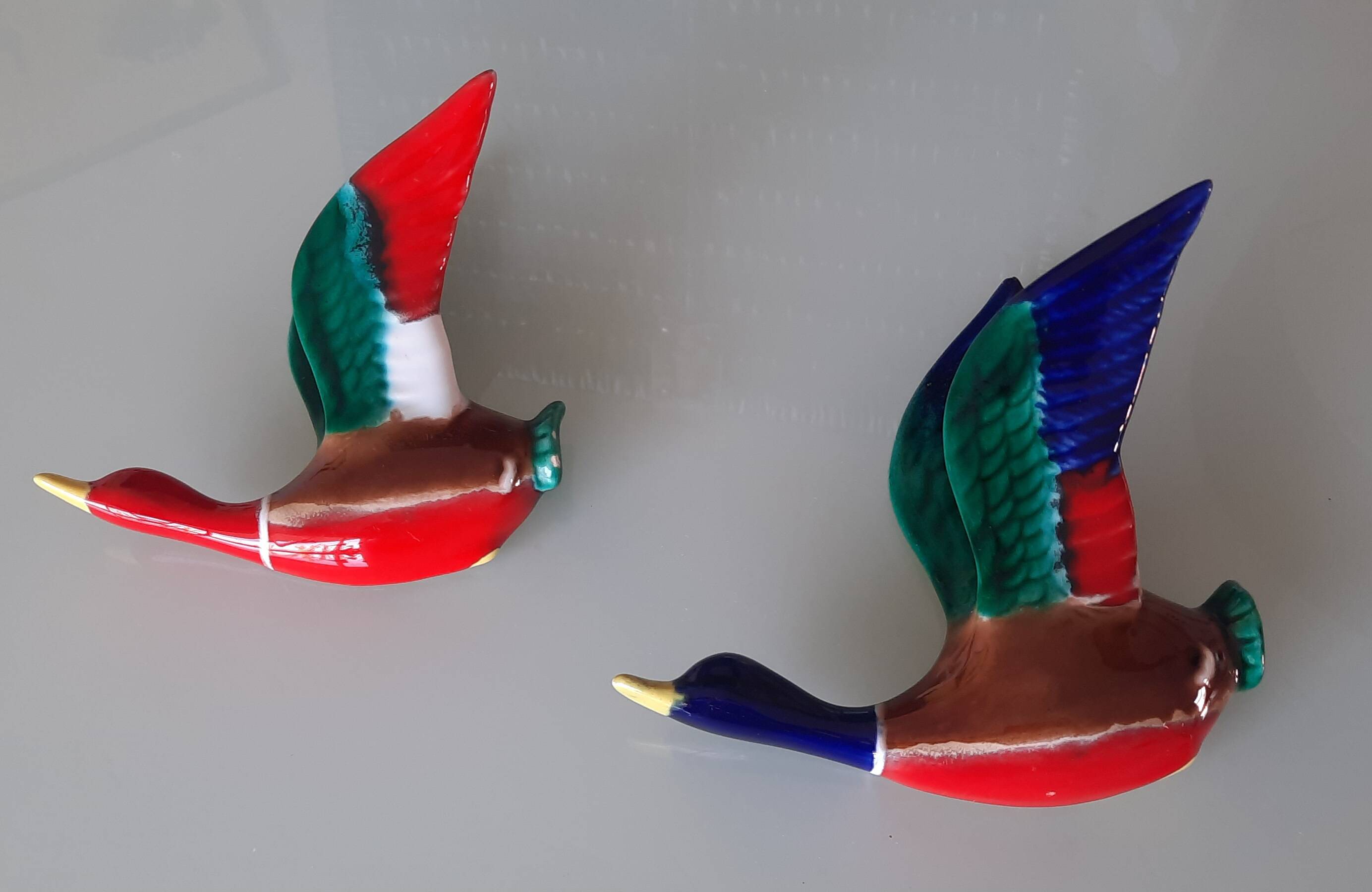 Pair of glazed ceramic wall ducks