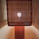 Bedside lamp in raffia