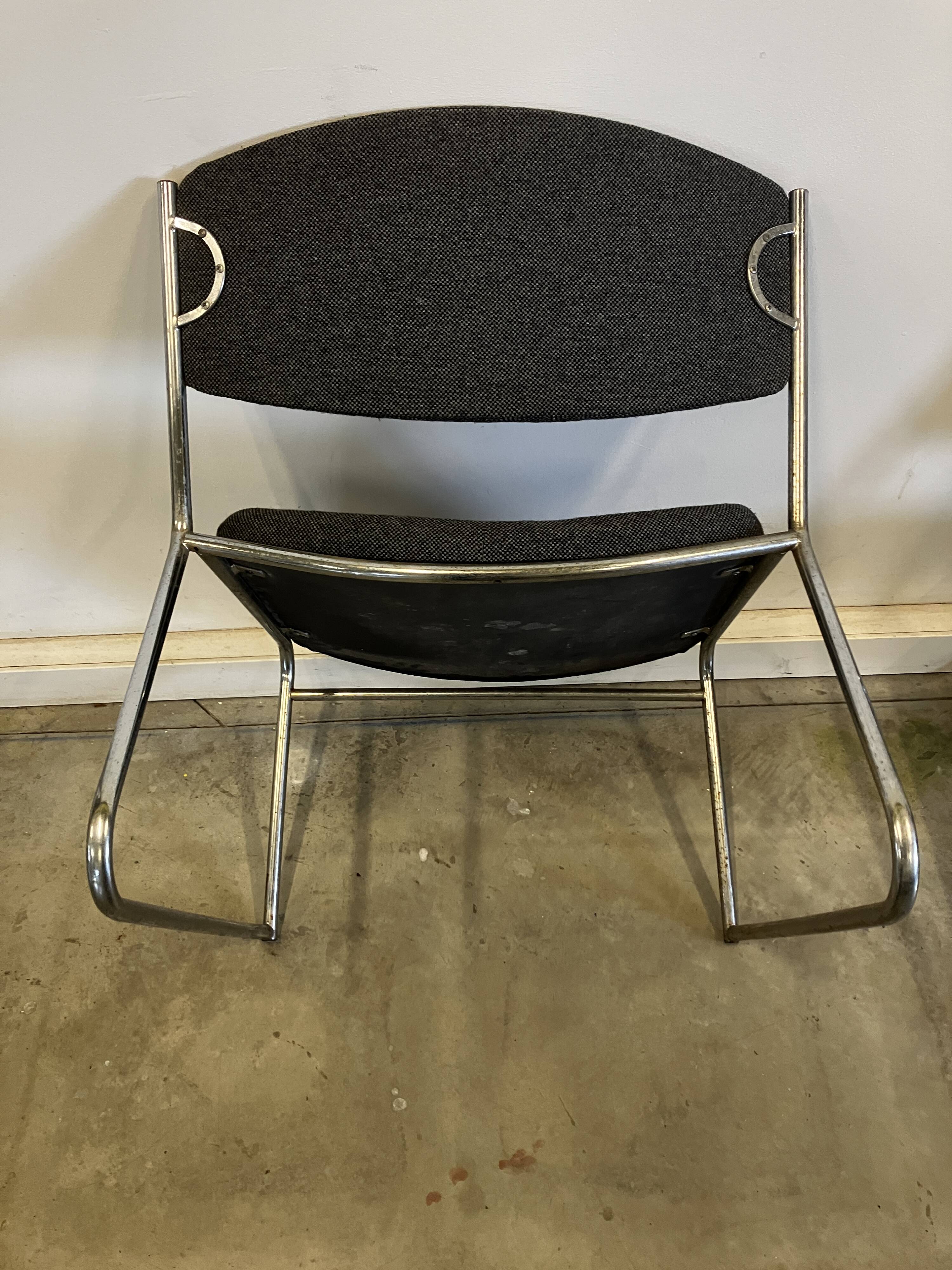 Pair of vintage armchairs in metal and grey mottled fabric.