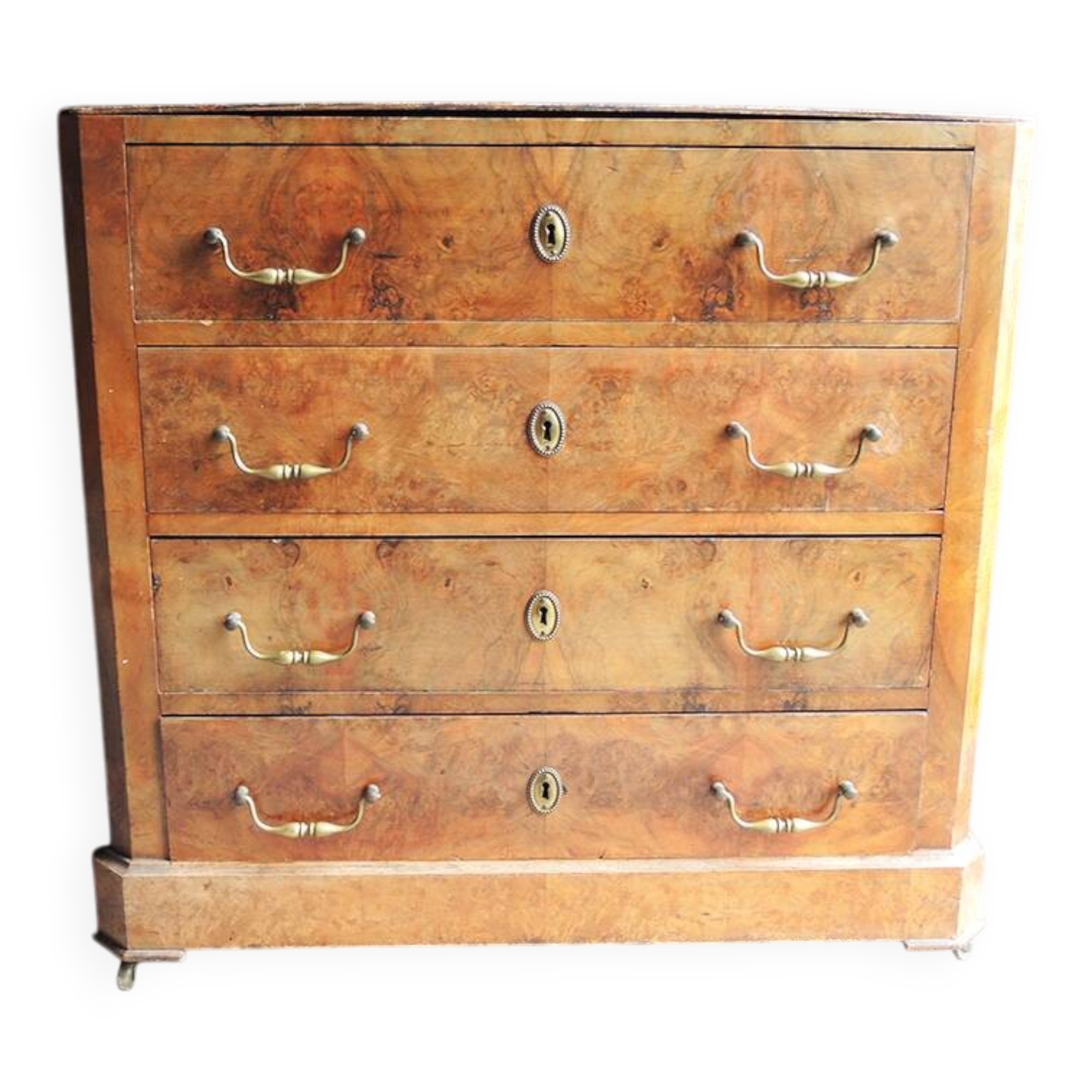Old wooden chest of drawers with 4 drawers on wheels