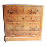 Old wooden chest of drawers with 4 drawers on wheels