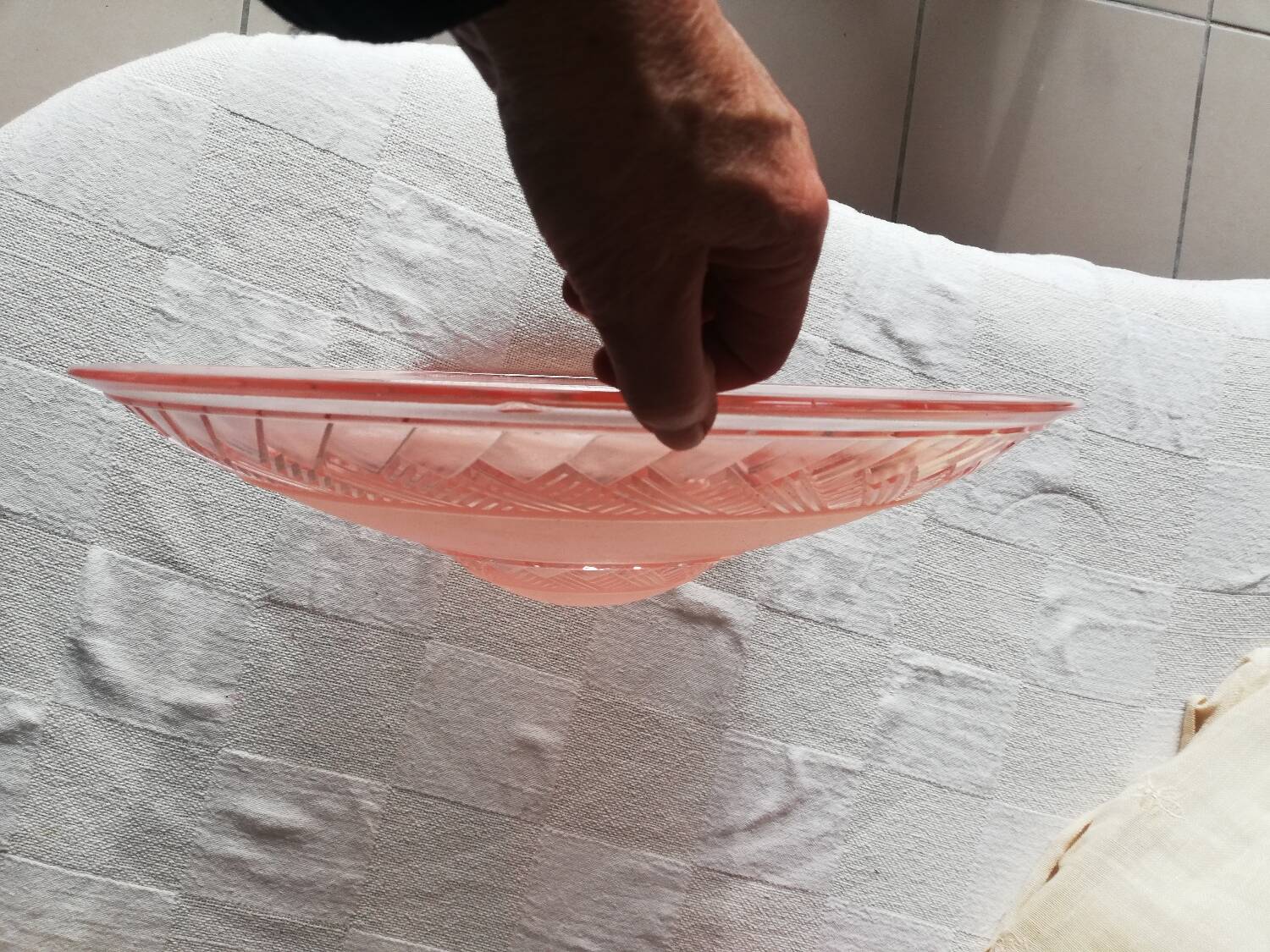 Antique ceiling light in frosted and engraved pink glass.