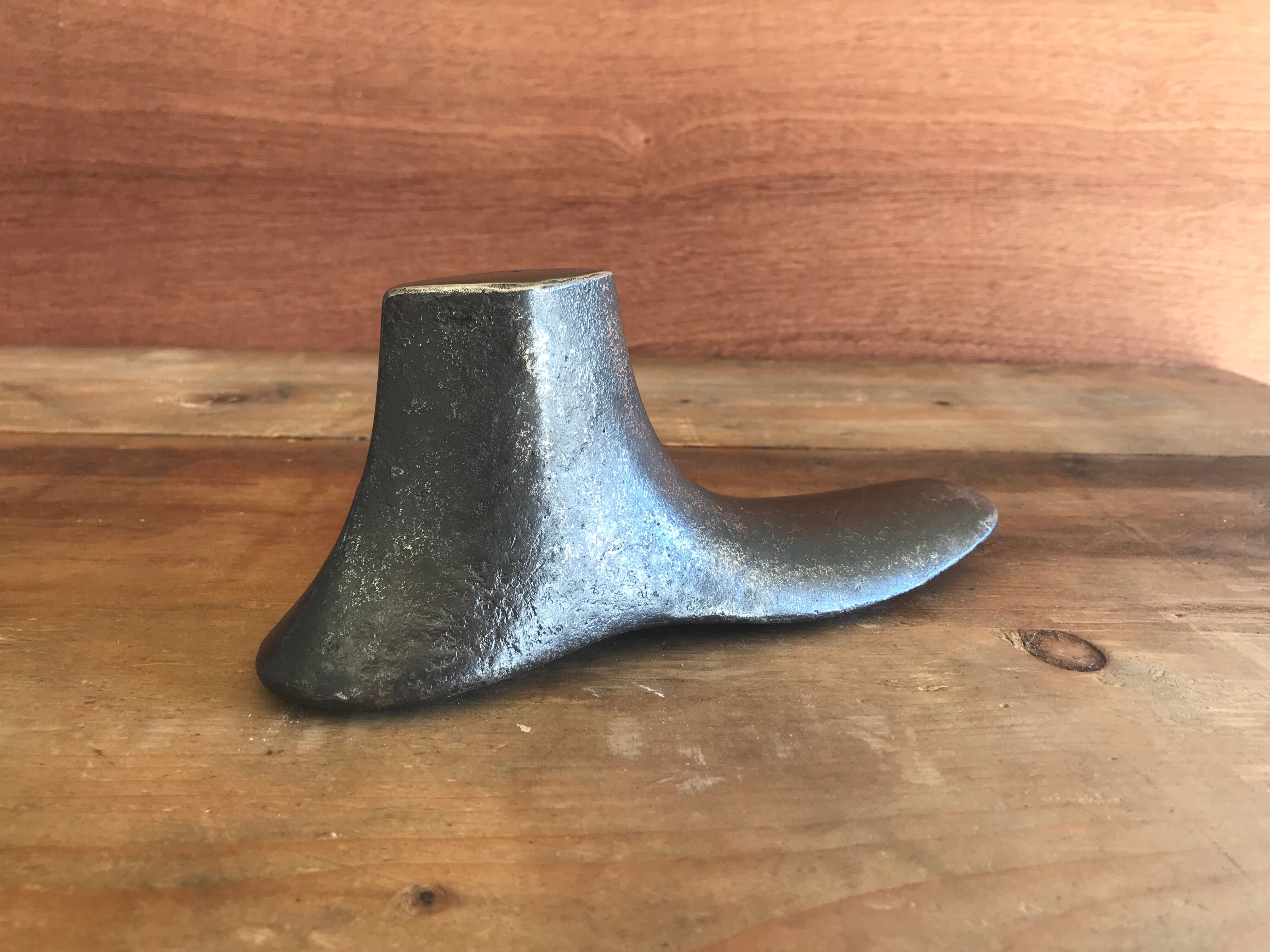 Vintage metal shoemaker's foot