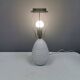 Older ceramic table lamp with beautiful details.