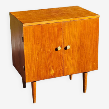 Vintage golden oak sideboard with conical legs from the 1950s